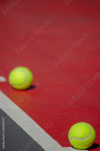 Close-up view of tennis balls on the court during a match