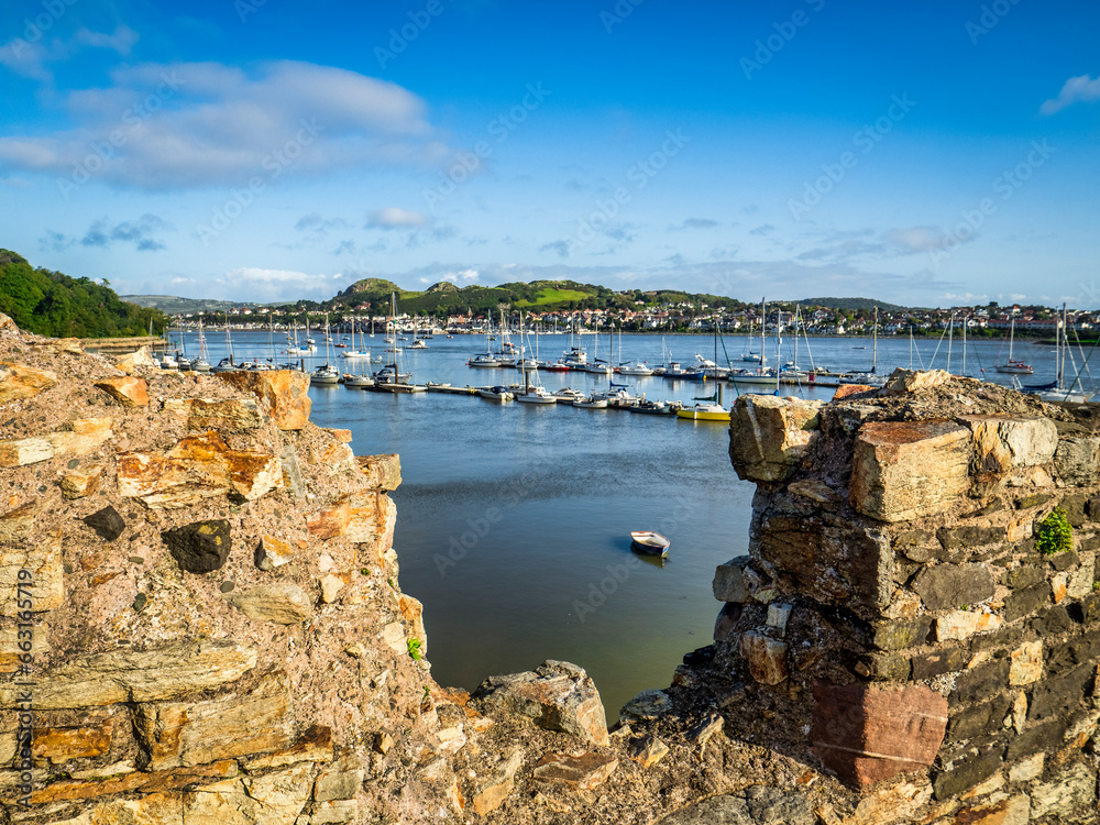 Conwy River Estuary from the 13th Century town walls, looking towards the former site of Deganwy Castle, the two rounded hills in the distance.