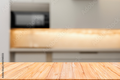 Wooden table on blurred kitchen bench background. Empty wooden table and blurred kitchen background