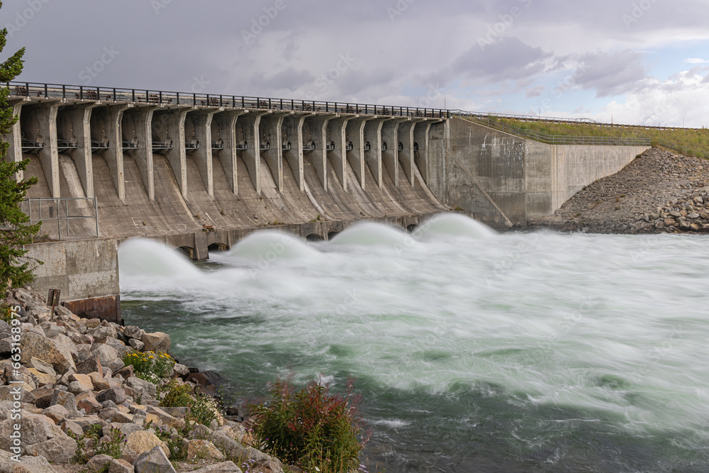 The Jackson Lake Dam and the Snake River in the Grand Teton National Park