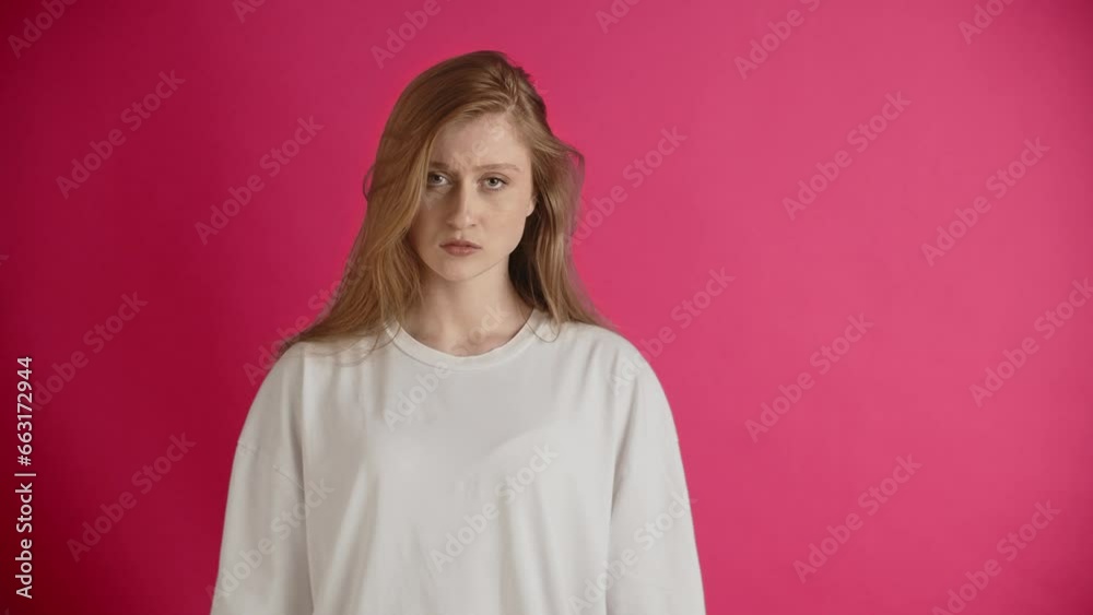 Girl in negative emotions of disappointment and anger. Lady in displeasure with broken heart and dreams. Resentment towards a friend, girlfriend, loved or colleague. The lady upsets because of failure Girl in negative emotions of disappointment and anger. Lady in displeasure with broken heart and dreams. Resentment towards a friend, girlfriend, loved or colleague. The lady upsets because of failure