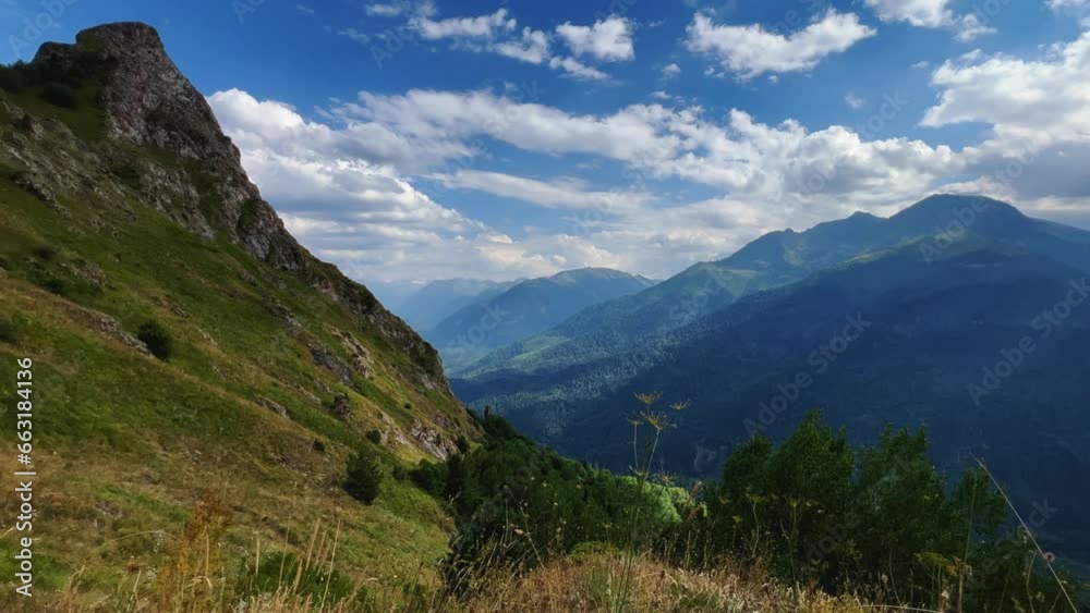 View of the mountain range near Mount Zakan. The top of the mountain node of the western part of the main ridge of the Greater Caucasus. Zakan Peak is the beginning of the Magisho mountain range. 4К View of the mountain range near Mount Zakan. The top of the mountain node of the western part of the main ridge of the Greater Caucasus. Zakan Peak is the beginning of the Magisho mountain range. 4К