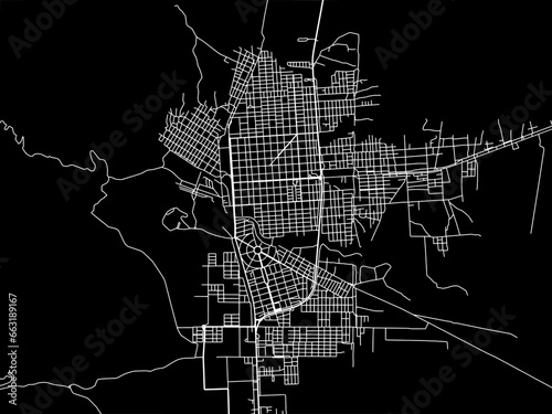 Vector road map of the city of  Tartagal in Argentina with white roads on a black background. photo