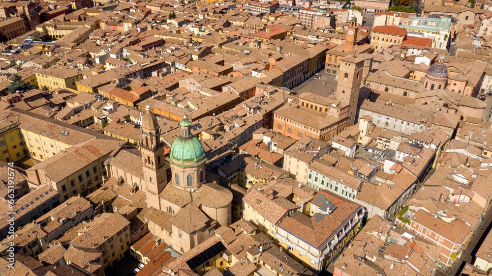 Aerial view on Piazza Prampolini in the historic center of Reggio Emilia, Italy. In the foreground there is the dome of the church of San Giorgio.