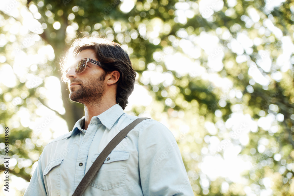 Relax, thinking or man in park walking in summer for fresh air, holiday vacation or break in garden in Italy. Explore, sunglasses or male person in nature or natural environment for travel Relax, thinking or man in park walking in summer for fresh air, holiday vacation or break in garden in Italy. Explore, sunglasses or male person in nature or natural environment for travel