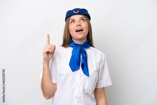 Airplane Lithuanian woman stewardess isolated on white background pointing up and surprised