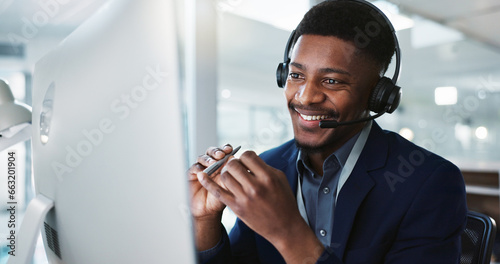 Computer, call center and black man talking, telemarketing and technical support at help desk. Communication, customer service and happy sales agent consulting, crm advisory and speaking to contact