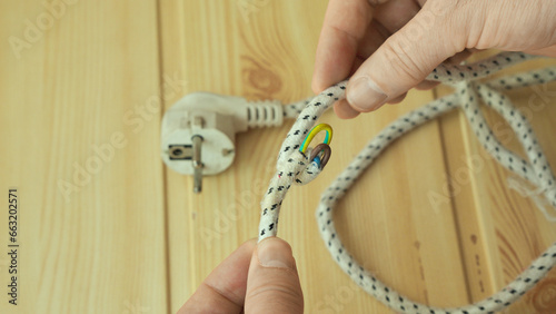 Damaged electrical wire insulation in household appliances.