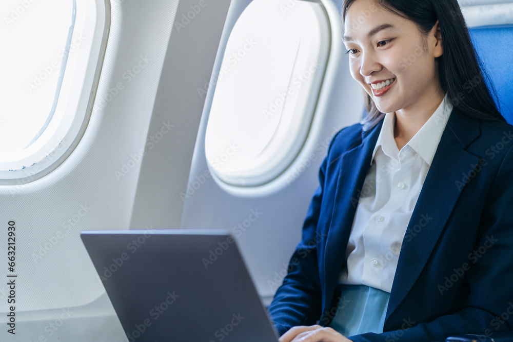 Woman working and update with calendar, schedule, timetable, and management, event planning sitting in airplane.