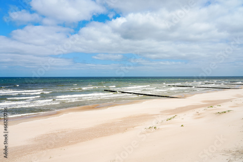 Beach near Trzesacz in Poland. Natural coast on the Polish Baltic Sea with white sand. Landscape by the sea in West Pomerania.