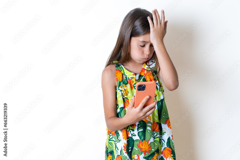 Upset depressed MODEL makes face palm as forgot about something important holds mobile phone expresses sorrow and regret blames Upset depressed MODEL makes face palm as forgot about something important holds mobile phone expresses sorrow and regret blames