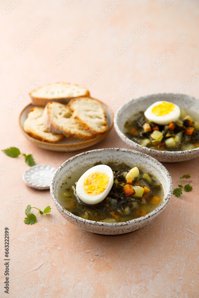 Traditional nettle soup with hard boiled egg