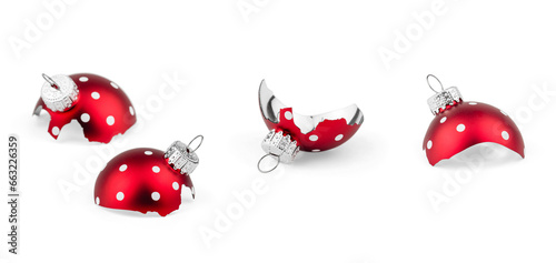 Christmas ball fragments. Broken red ornament on a white background.