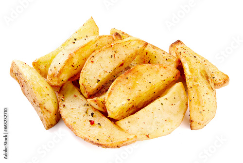 Fresh baked potato wedges with seasonings, on a white background