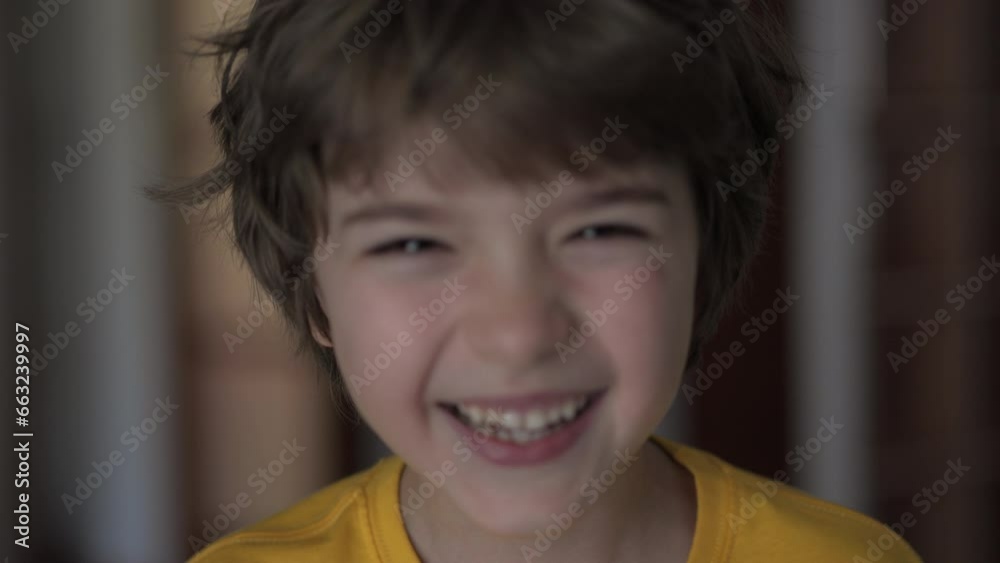 Portrait of Happy Little Child Bursting in Laugh. Kid Laughs Indoors Closeup. Confident Inquisitive Laughs Happy Caucasian Teenage Boy. Happy positive Child Laughing at Funny Joke Looking at Camera. Portrait of Happy Little Child Bursting in Laugh. Kid Laughs Indoors Closeup. Confident Inquisitive Laughs Happy Caucasian Teenage Boy. Happy positive Child Laughing at Funny Joke Looking at Camera.