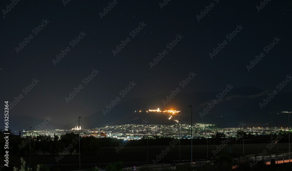 Views of the illuminated city of Jaen 15 kilometers away in the middle of the night. Andalucia.