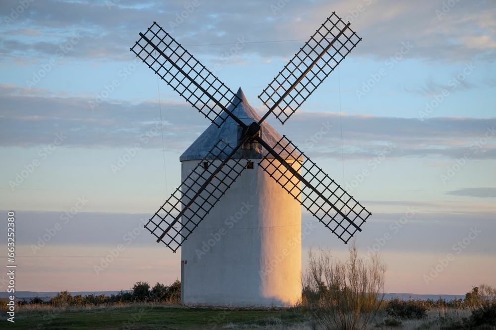 Large windmill in the middle of the countryside in a summer suns