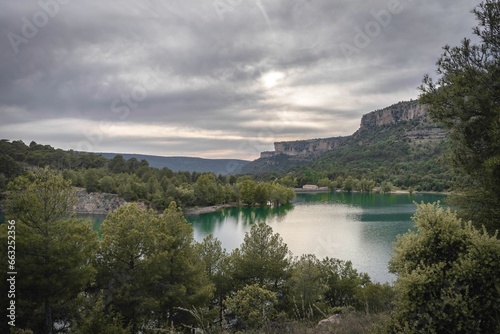 Green landscape of trees, lake and mountains in Una. Spain