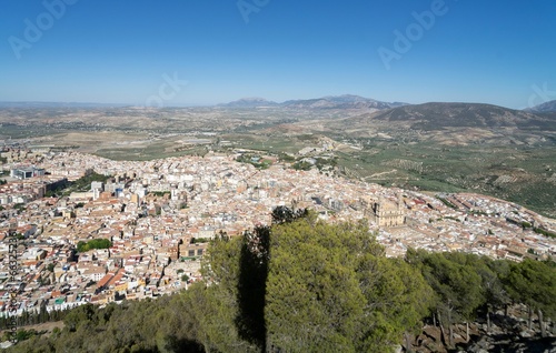 Aerial landscape of the city of Jaen with its houses and the cathedral as well as its mountains.