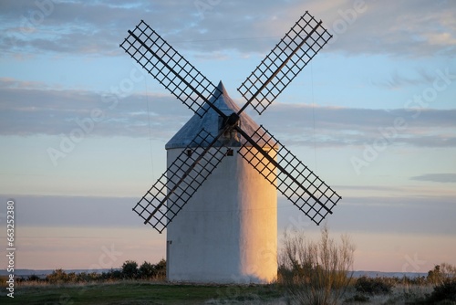Large windmill in the middle of the countryside in a summer suns