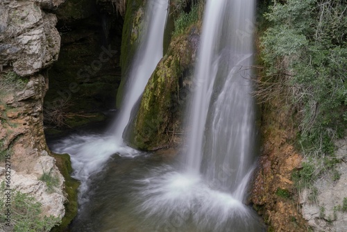 Strong waterfall in the Alto Tajo mountain range © Wirestock