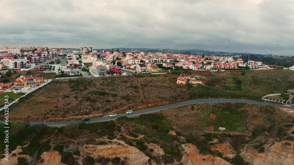 Aerial view of the beautiful landscape of Atlantic ocean coastline, Portugal. No people. Summer. Cloudy sky. Drone top view natural seascape with ocean rocky shore Scenic tourist travel destination. Aerial view of the beautiful landscape of Atlantic ocean coastline, Portugal. No people. Summer. Cloudy sky. Drone top view natural seascape with ocean rocky shore Scenic tourist travel destination.