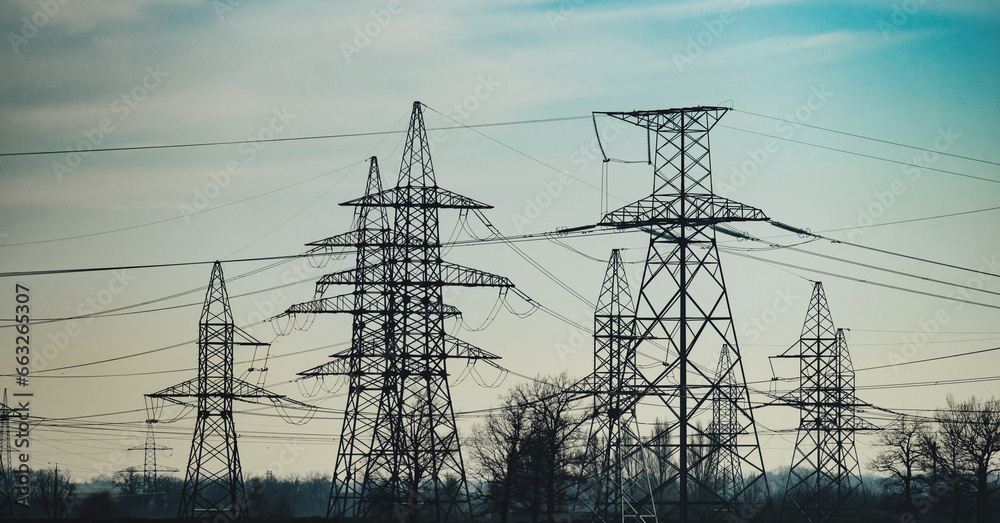 Power lines in the morning. The Contour of Transmission Tower in the ...