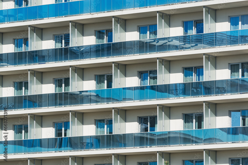 Balconies and windows of the apartment house. Balconies and windows of the apartment house.