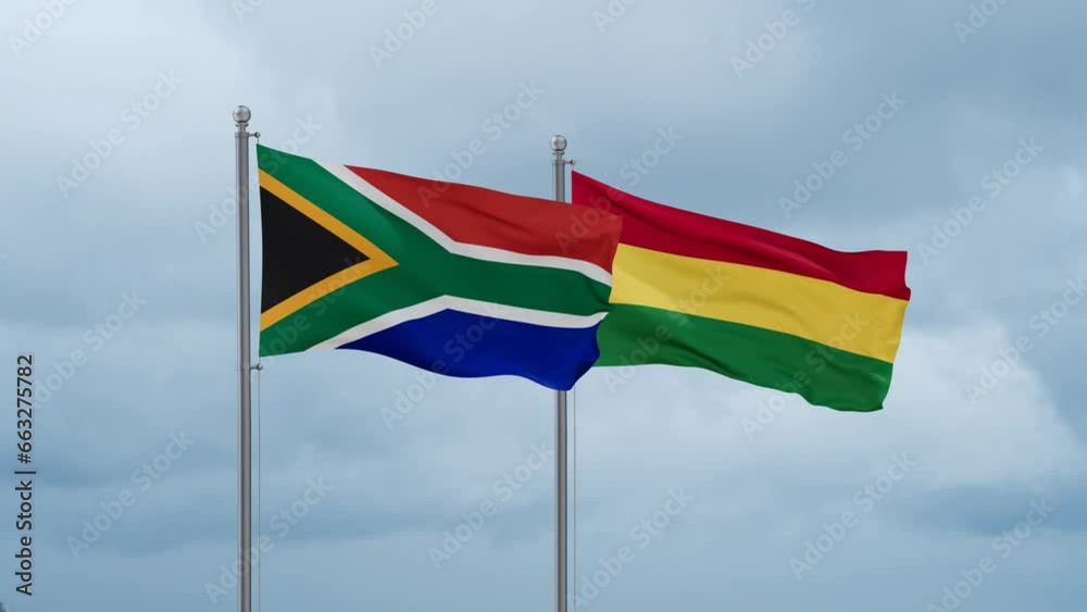 Bolivia flag and South Africa flag waving together on cloudy sky, endless seamless loop, two country relations concept Bolivia flag and South Africa flag waving together on cloudy sky, endless seamless loop, two country relations concept