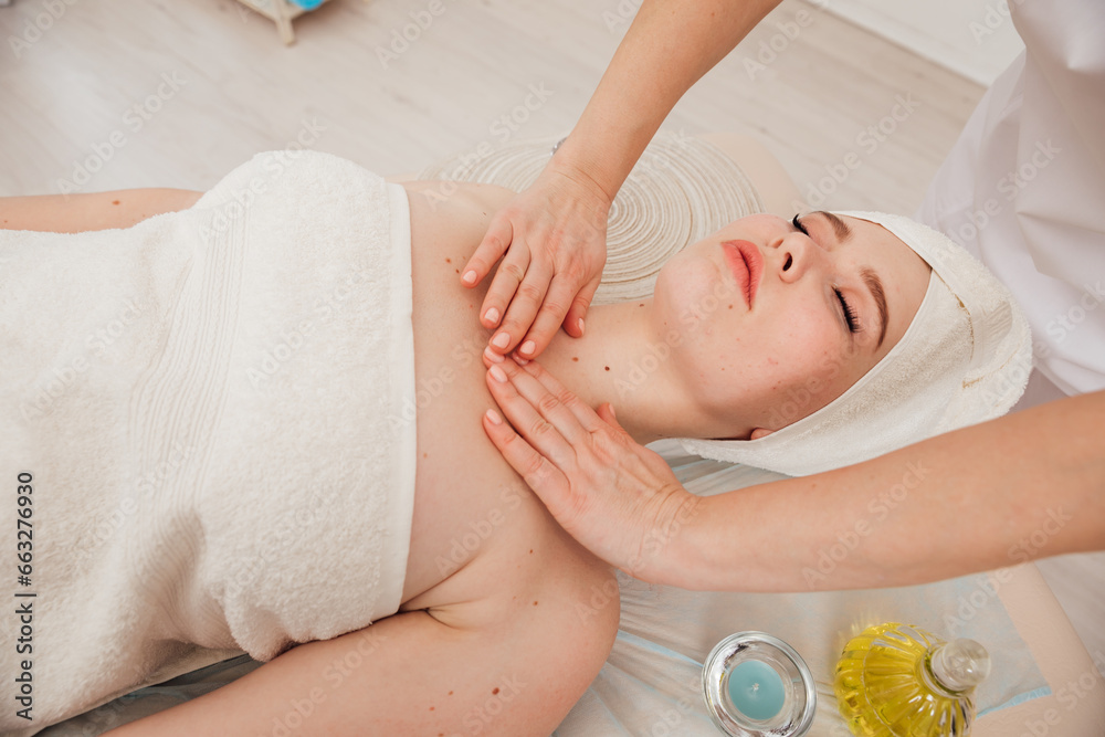 Facial massage with stones in the massage room relax spa Facial massage with stones in the massage room relax spa