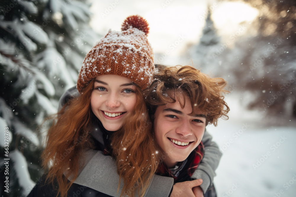 happy smiling portrait of a couple wearing warm clothes in winter forest happy smiling portrait of a couple wearing warm clothes in winter forest