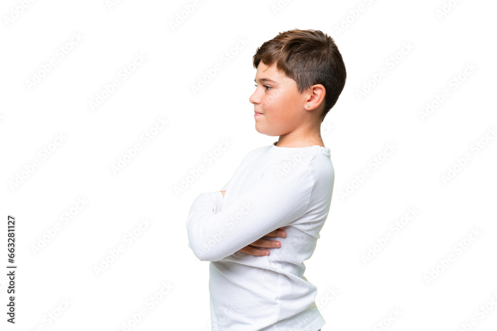 Little caucasian kid over isolated chroma key background in lateral position Little caucasian kid over isolated chroma key background in lateral position