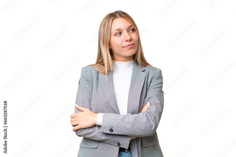 Young pretty blonde woman over isolated chroma key background keeping the arms crossed Young pretty blonde woman over isolated chroma key background keeping the arms crossed