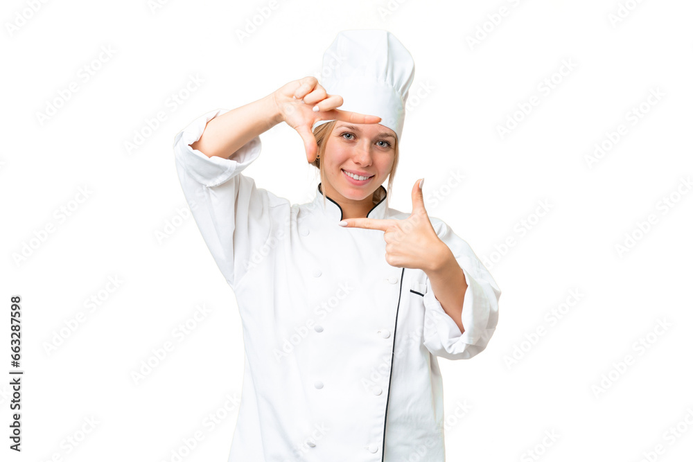 Young chef woman over isolated chroma key background focusing face. Framing symbol Young chef woman over isolated chroma key background focusing face. Framing symbol
