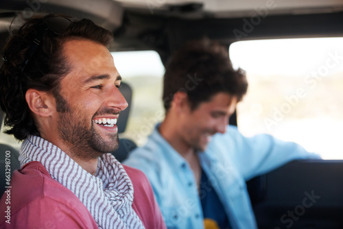 Travel, driving and happy men friends in a car for road trip, adventure or vacation together. Freedom, transportation and people laughing in a vehicle for holiday, trip or journey in the countryside © Marine G/peopleimages.com