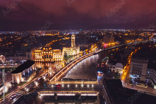 Oradea romania tourism aerial a mesmerizing nighttime view of a historic European city, showcasing its iconic attractions and rich heritage