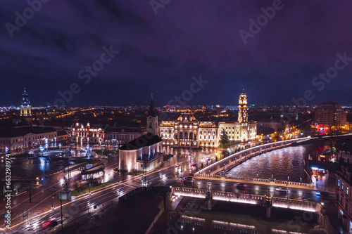 Oradea romania tourism aerial a stunning nighttime cityscape from a birds-eye view, showcasing the historic charm and iconic attractions of this European destination