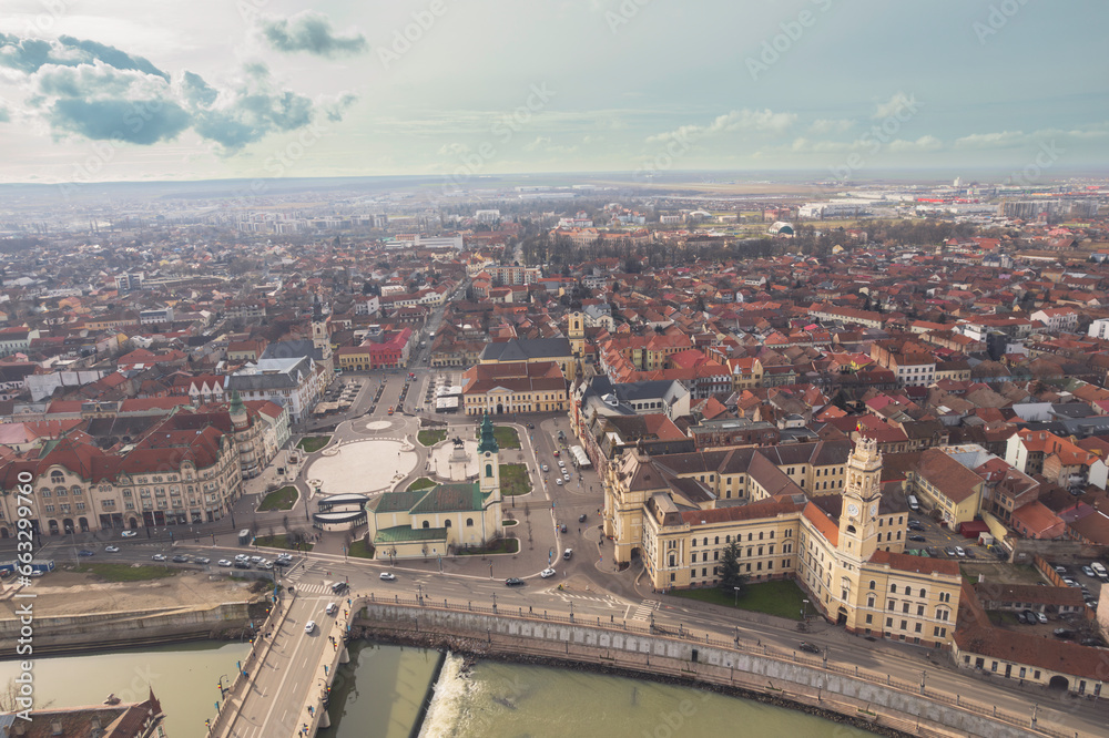 Obraz premium Aerial art nouveau historical a beautiful cityscape with a river flowing through the heart of Oradea, showcasing its rich history and stunning art nouveau architecture incity Oradea, Bihor, Romania