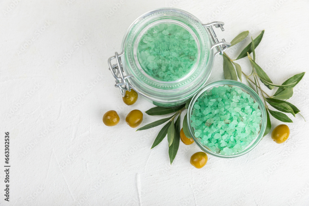 Spa sea salt on the test table. Sea salt with olive extract on the table. Beauty concept. Sea bath salt. Space for text, space for copy. Close-up. Spa sea salt on the test table. Sea salt with olive extract on the table. Beauty concept. Sea bath salt. Space for text, space for copy. Close-up.