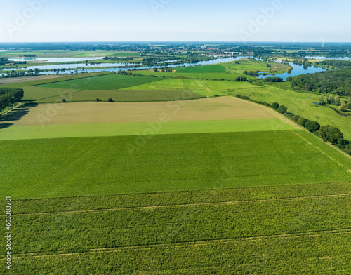 Aerial view of countryside with farmland and river Maas, Wieler, Swalmen, Limburg, Netherlands. photo