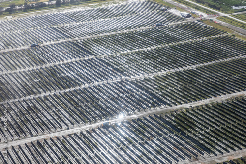 Aerial view of Solar Panels Harnessing Sustainable Sunlight, Bangholme, Victoria, Australia. photo