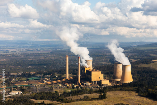 Aerial view of Power Plant Stacks Emitting Billowing Steam, Victoria, Australia. photo