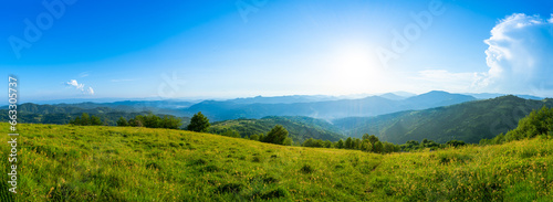 Carpathians mountains landscapes from green meadow on sunset, Apetska mountain, Ukraine