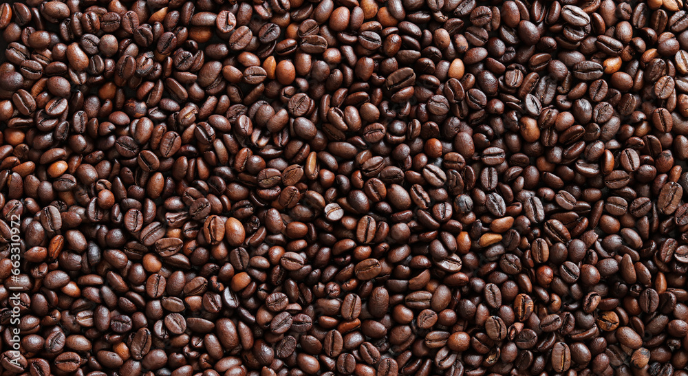 Top view of background representing halves of dark brown coffee beans. Roasted coffee beans, copy space Top view of background representing halves of dark brown coffee beans. Roasted coffee beans, copy space