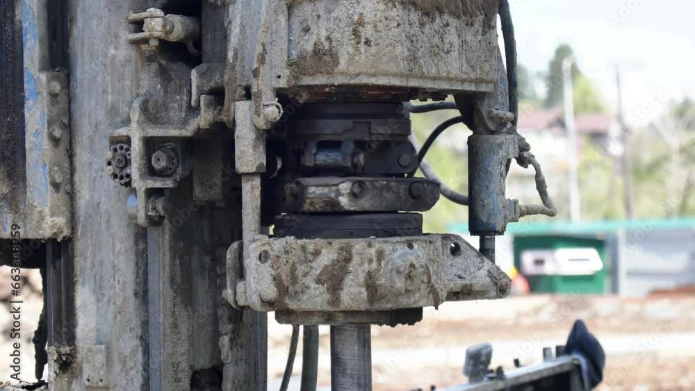 A specialized drilling mechanism designed for construction, focusing on efficient pile drilling for establishing a strong foundation, close-up. A specialized drilling mechanism designed for construction, focusing on efficient pile drilling for establishing a strong foundation, close-up.