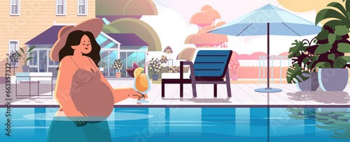 pregnant woman with cocktail relaxing in swimming pool pregnancy motherhood expectation concept