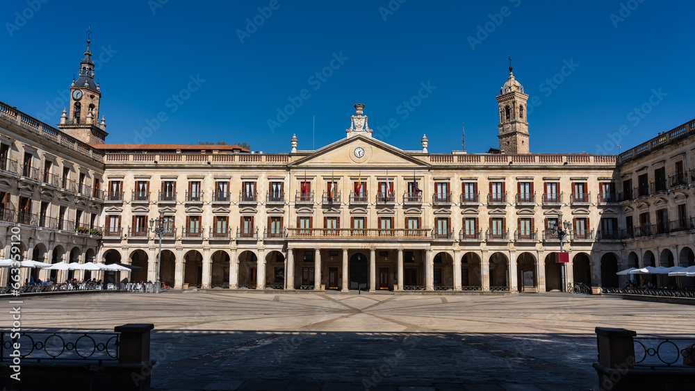 Buildings of the Plaza de Spain, in their columns and arcades in the city of Vitoria, Basque Country.