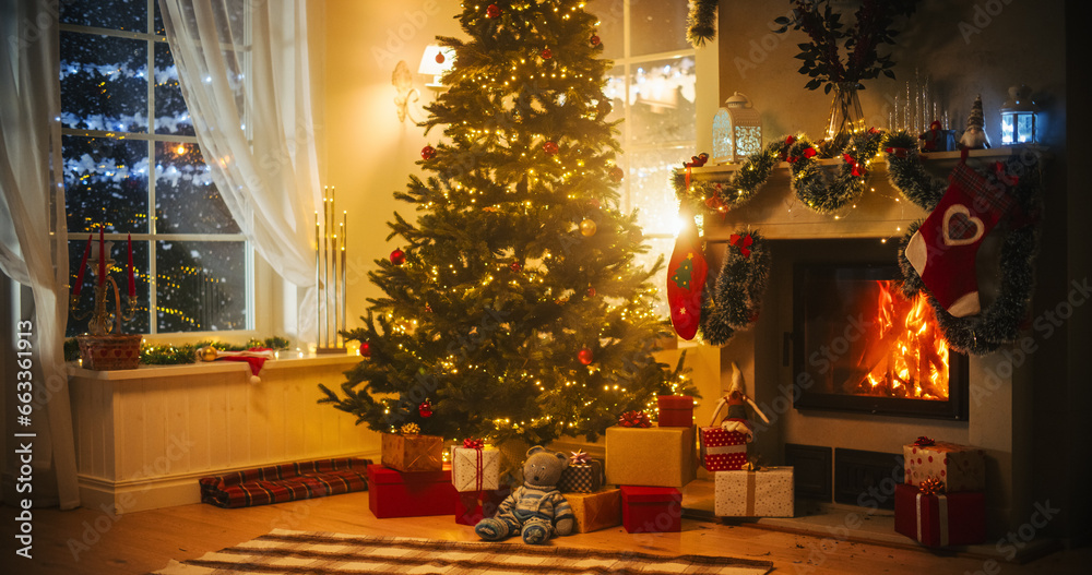 Warm Atmosphere on a Winter Snowy Night: Empty Shot of Home Interior with Fireplace Decorated with Christmas Tree, Gifts, Ornaments, Garlands and Stockings. Magical Time of a Holiday Full of Happiness