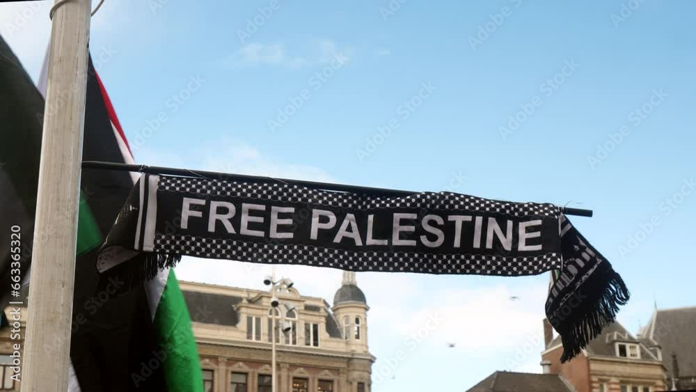 Banners with Free Palestine at Pro Palestine demonstration in Amsterdam, Netherlands.