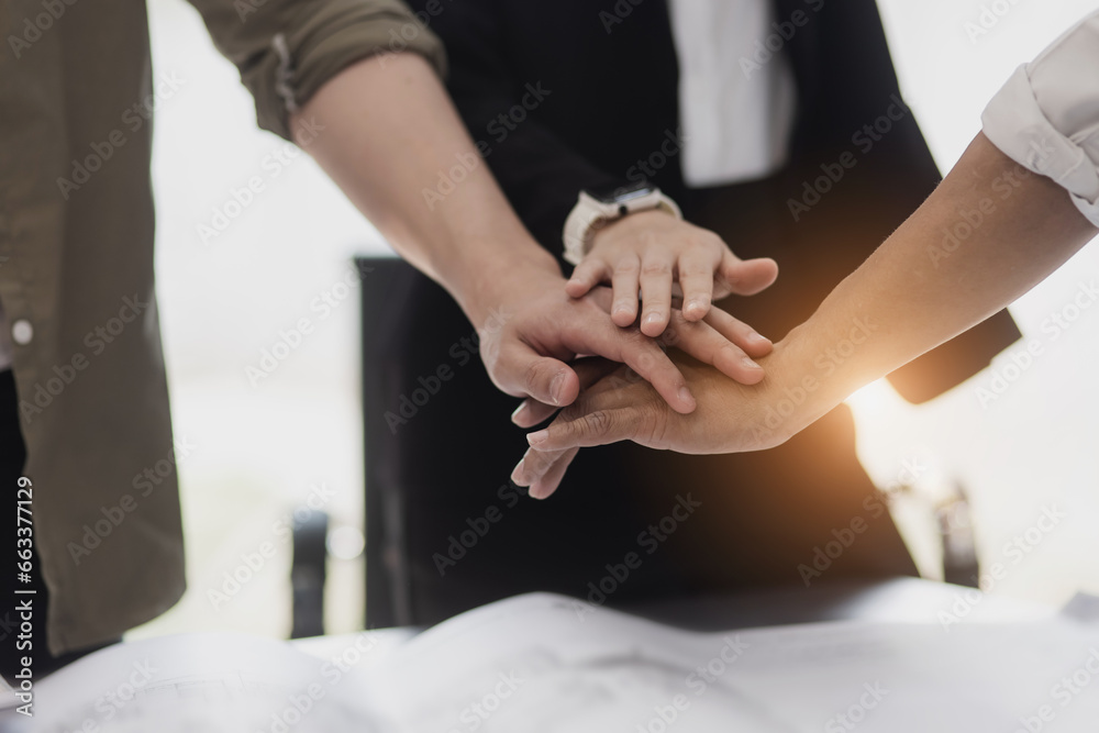 People hand shake in office desk, Business man shaking hands after contract signing. People hand shake in office desk, Business man shaking hands after contract signing.